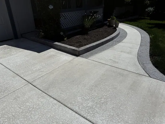 Finished decorative concrete driveway and walkway by AM Concrete in the Portland metro